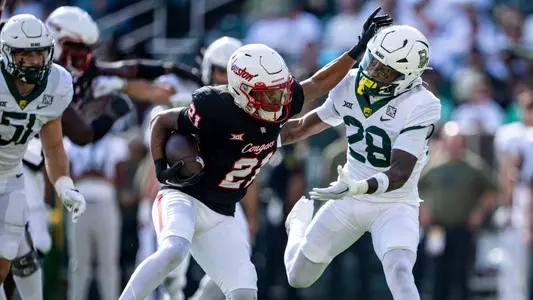 Stacy Sneed stiff arms Baylor defender