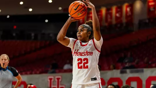 Kayla King shooting basketball