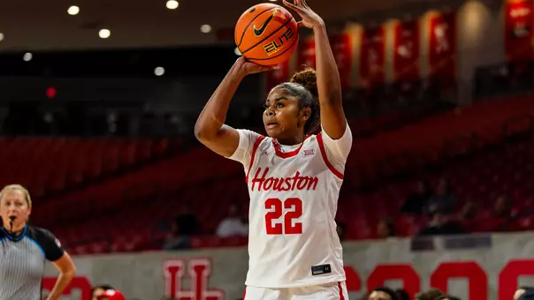 Kayla King shooting basketball