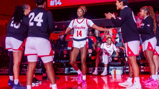 Jade Jones walking towards teammates during starting lineups