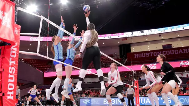 Tara Greenberry attacks a ball against Kansas.