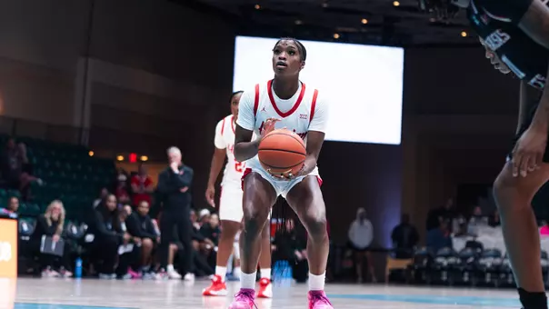 Jade Jones with basketball in hand getting ready to shoot free throw vs. Arkansas State