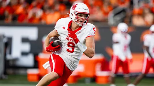 Tanner Koziol cuts to continue running up the field after making a catch.