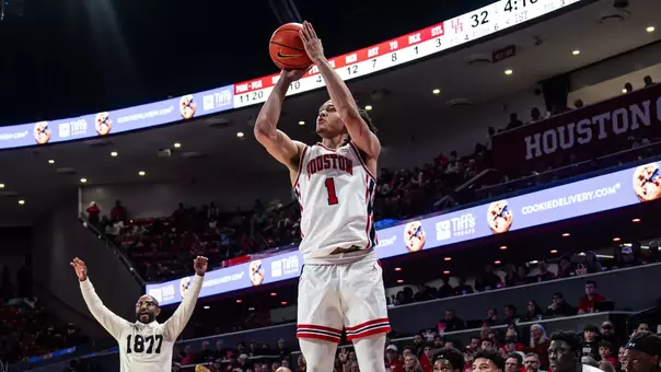 Isiah Harwell shooting the ball.