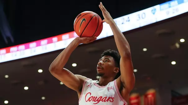 Chase McCarty shoots a baksetball