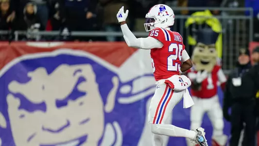 Dec 1, 2025; Foxborough, Massachusetts, USA; New England Patriots cornerback Marcus Jones (25) celebrates after returning a punt for a touchdown during the first quarter against the New York Giants at Gillette Stadium. Mandatory Credit: David Butler II-Imagn Images