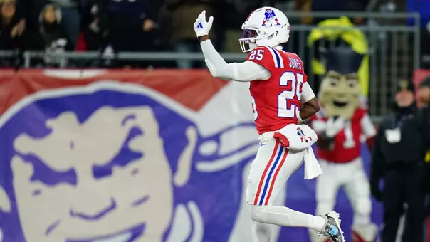 Dec 1, 2025; Foxborough, Massachusetts, USA; New England Patriots cornerback Marcus Jones (25) celebrates after returning a punt for a touchdown during the first quarter against the New York Giants at Gillette Stadium. Mandatory Credit: David Butler II-Imagn Images