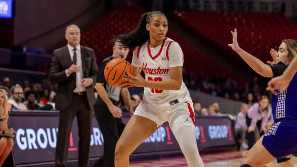 Jorynn Ross with basketball in hand vs. High Point