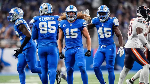 Detroit Lions linebacker Grant Stuard (15) celebrates a play against Chicago Bears during the second half at Ford Field in Detroit on Sunday, Sept. 14, 2025.