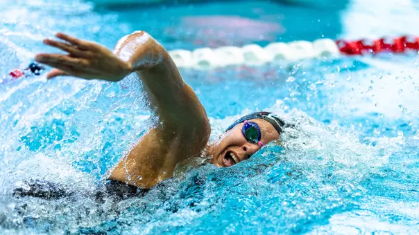 Liya Goupil swimming the freestyle at the Phill Hansel Invitational meet