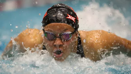 Senior Noor El Gendy swimming the butterfly at the Big 12 East Showdown