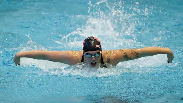 Junior Sydney Nethercutt swimming the butterfly at the Big 12 East Showdown