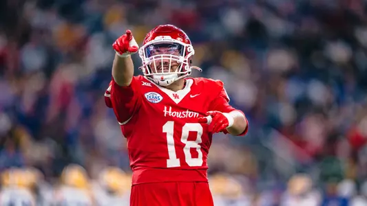 Khalil Laufau points to crowd in Texas Bowl