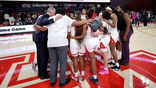 Women's Basketball Huddle Photo