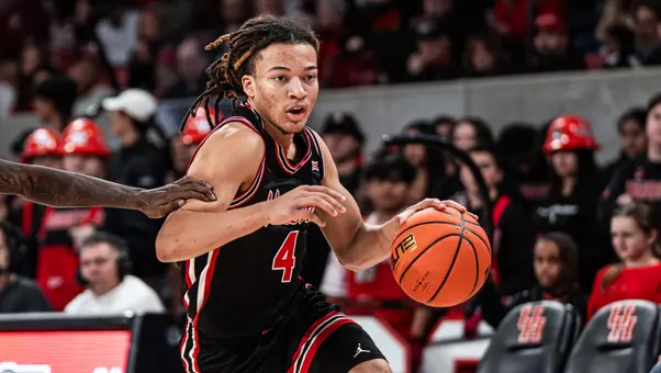 Kingston Flemings driving the basketball