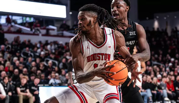 Joseph Tugler, with ball going to basket