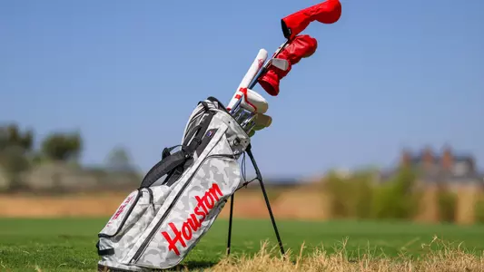 Golf bag sitting on the course