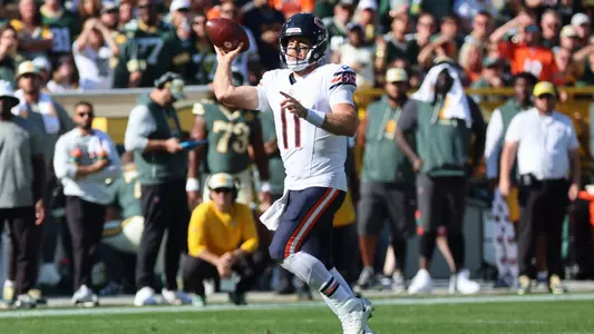 Oct 11, 2026; Green Bay, Wisconsin, USA; Chicago Bears quarterback Case Keenum (11) passes the ball against the Green Bay Packers during the fourth quarter at Lambeau Field. Mandatory Credit: Mike Dinovo-Imagn Images