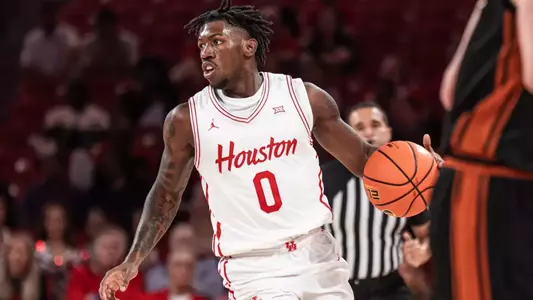Kordel Jefferson dribbles a basketball