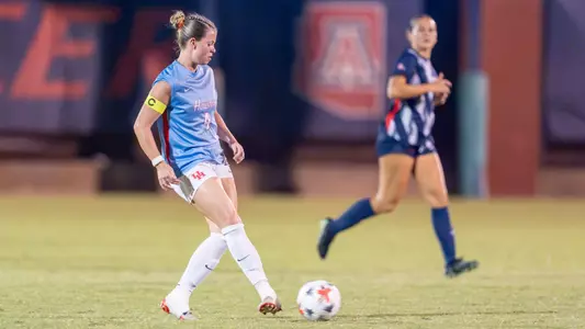 Morgan Donohue kicks a soccer ball