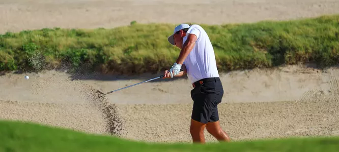 Grant Doggett hits his shot out of the bunker.