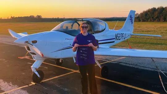 Morgan flies a plane