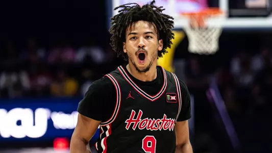 Dedan Thomas Jr. yells during Houston's exhibition win over Michigan