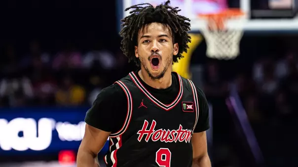 Dedan Thomas Jr. yells during Houston's exhibition win over Michigan
