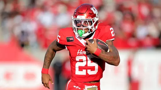 DJ Butler carrying the football