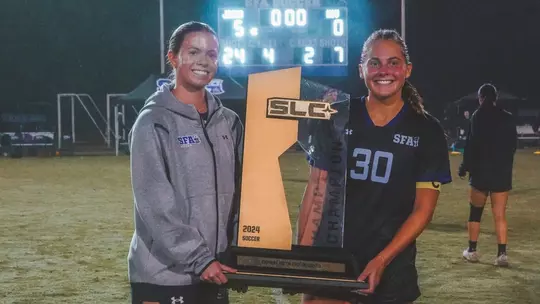 Morgan and Ella with SLC trophy