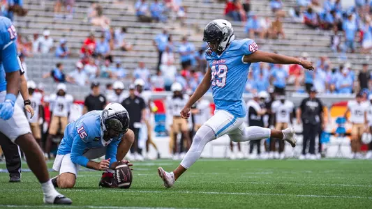 Jonathan Dimas kicking a field goal