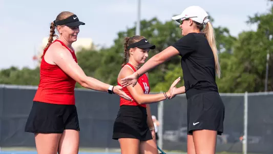 Tennis doubles handshake
