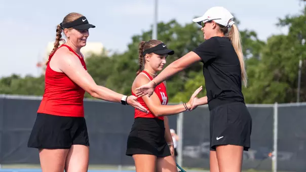 Tennis doubles handshake