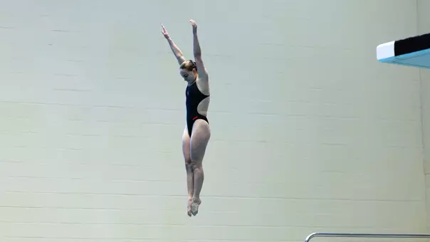 Junior Diver Michelle McLeod diving from the 3-meter springboard