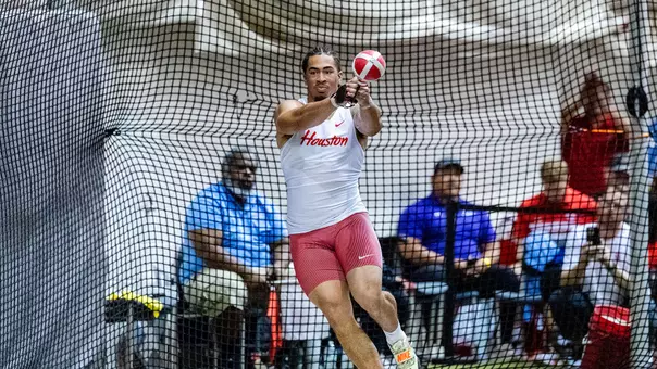 Ty Lott swinging a weight throw at the Howie Ryan Invitational