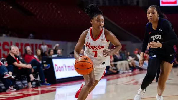 Kyndall Hunter dribbling ball against TCU defender
