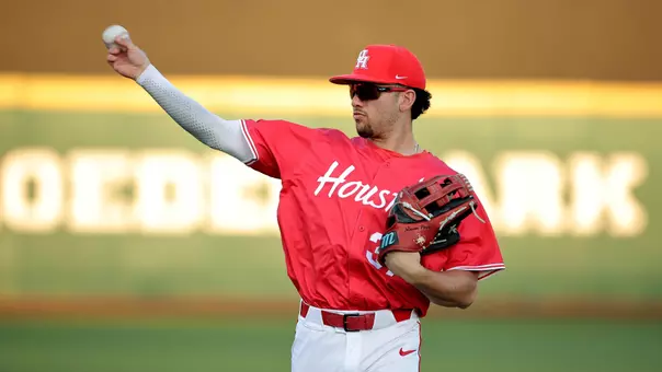 Xavier Perez throws a ball during warmups.