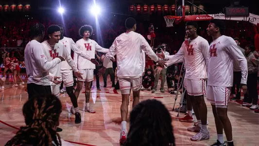 Chris Cenac Jr. is announced during starting lineups at a game inside Fertitta Center