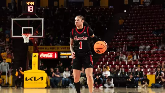 Briana Peguero dribbling basketball vs. Arizona State