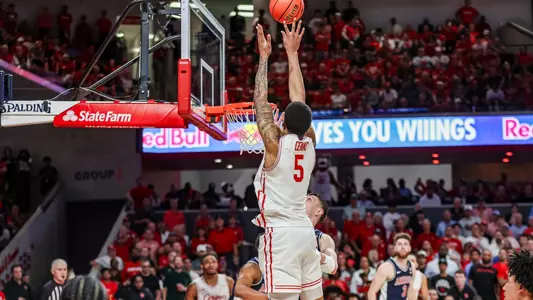 Chris Cenac shoots basketball