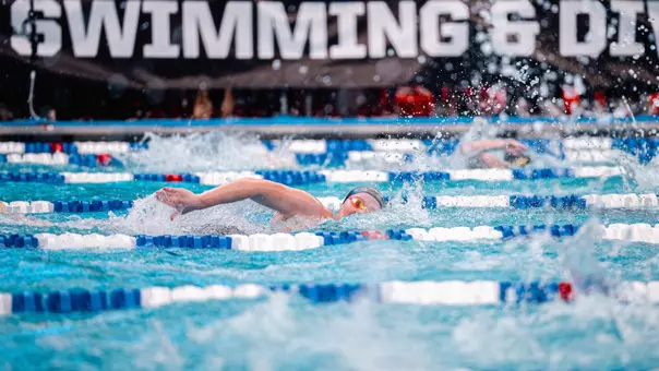 Sophomore Alexia Duncan swimming in the 200-yard IM at the Big 12 Swimming & Diving Championships