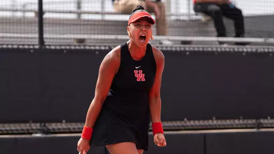 Chems Doha Zeghlouli celebrates after clinching the match against #35 Utah