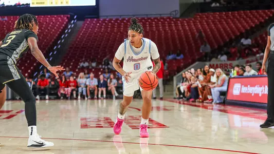 TK Pitts dribbling basketball vs. UCF defender