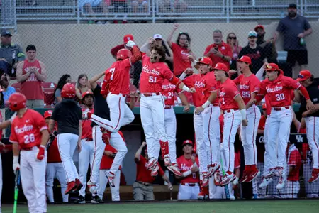 team celebration at home plate