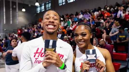 Jamar Marshall Jr and Kaycee McCoy celebrating with their Big 12 medals