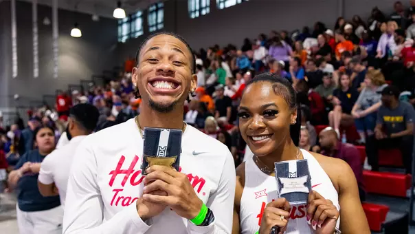 Jamar Marshall Jr and Kaycee McCoy celebrating with their Big 12 medals