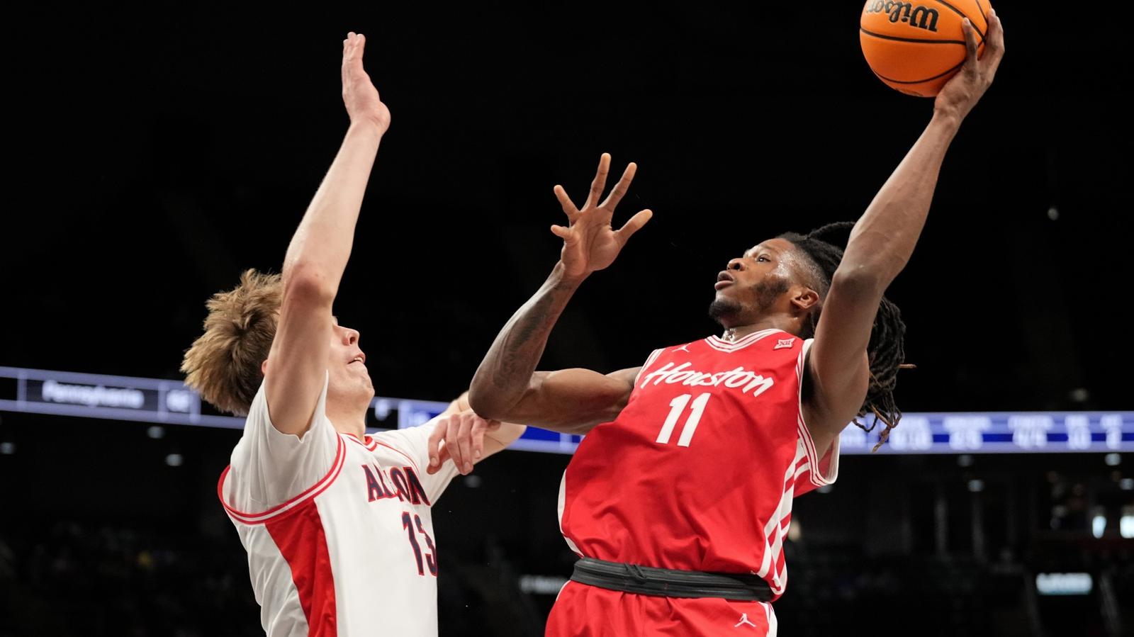 joseph tugler shooting ball over defender