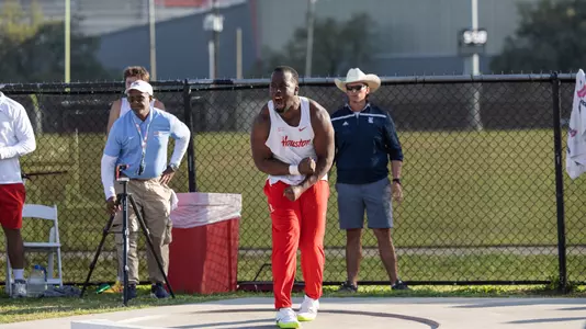 Cordell Nwokeji celebrating after his shot put throw at the Kirk Baptiste Invitational