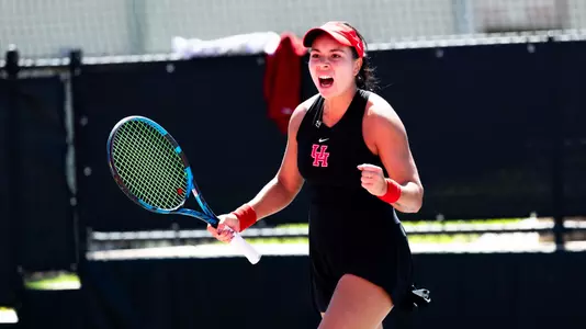 Elizaveta fist pumps in celebration