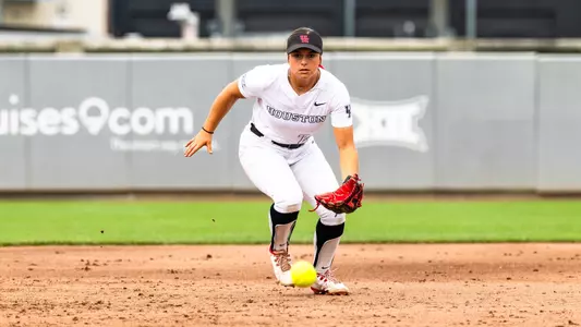 Makenna Mitchell fielding a grounder